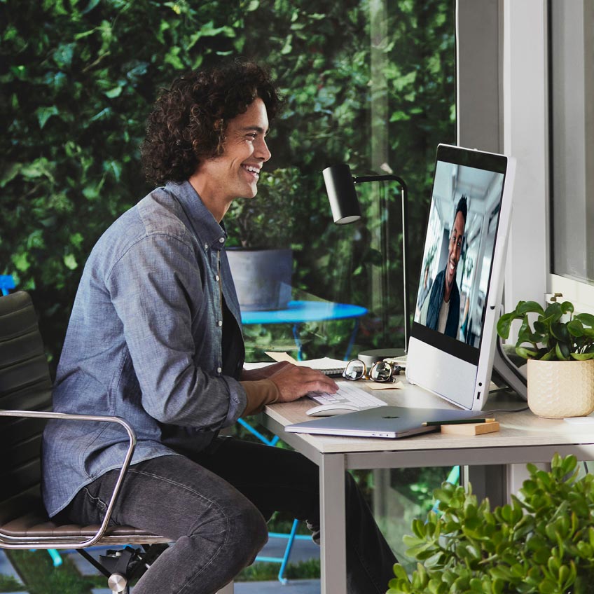 Mobile device with Webex displayed being used by someone outside