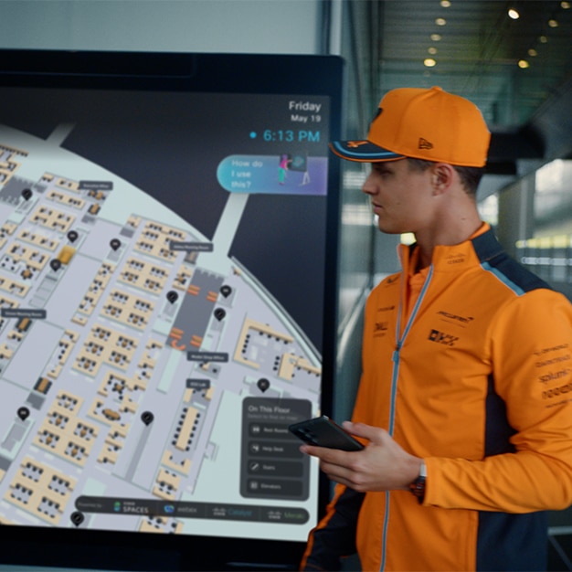 McLaren Formula 1 Team driver Lando Norris shown on a laptop screen, video conferencing via Webex.