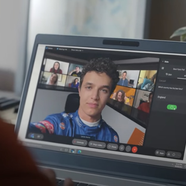 McLaren Formula 1 Team driver Lando Norris shown on a laptop screen, video conferencing via Webex.
