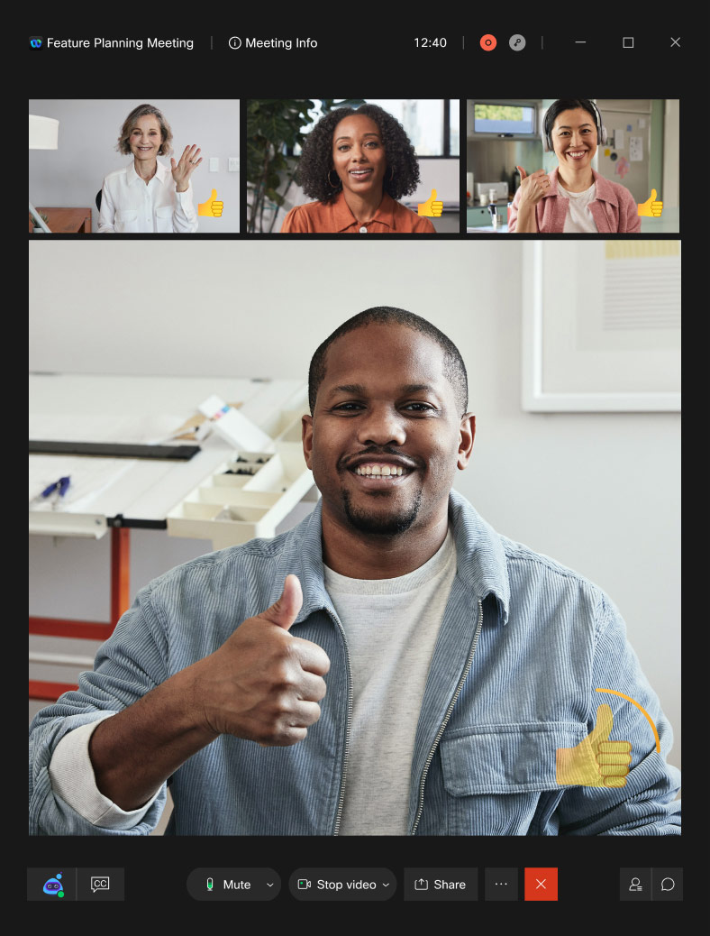 A screen shows four people engaged in a video conference. They are all using the Webex gesture recognition feature, which can render a participant wave and a thumbs up as an emoji reaction.