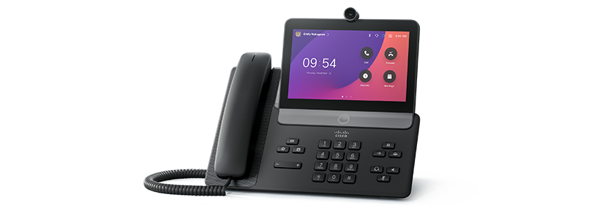 The Cisco Video Phone 8875 in the Carbon color (black).  Screen shows time of 9:54 and apps like Meetings and Call.