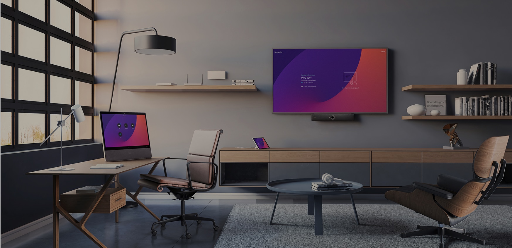 A dedicated office featuring a Webex Desk and a Webex Room Bar video bar.