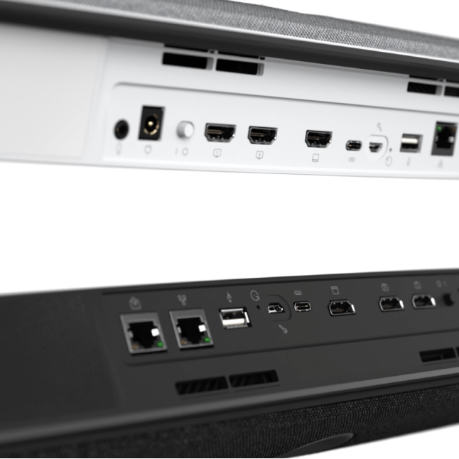 Cisco Desk Camera 1080p, shown from front, with green light indicating it’s on. Privacy shutter is open.