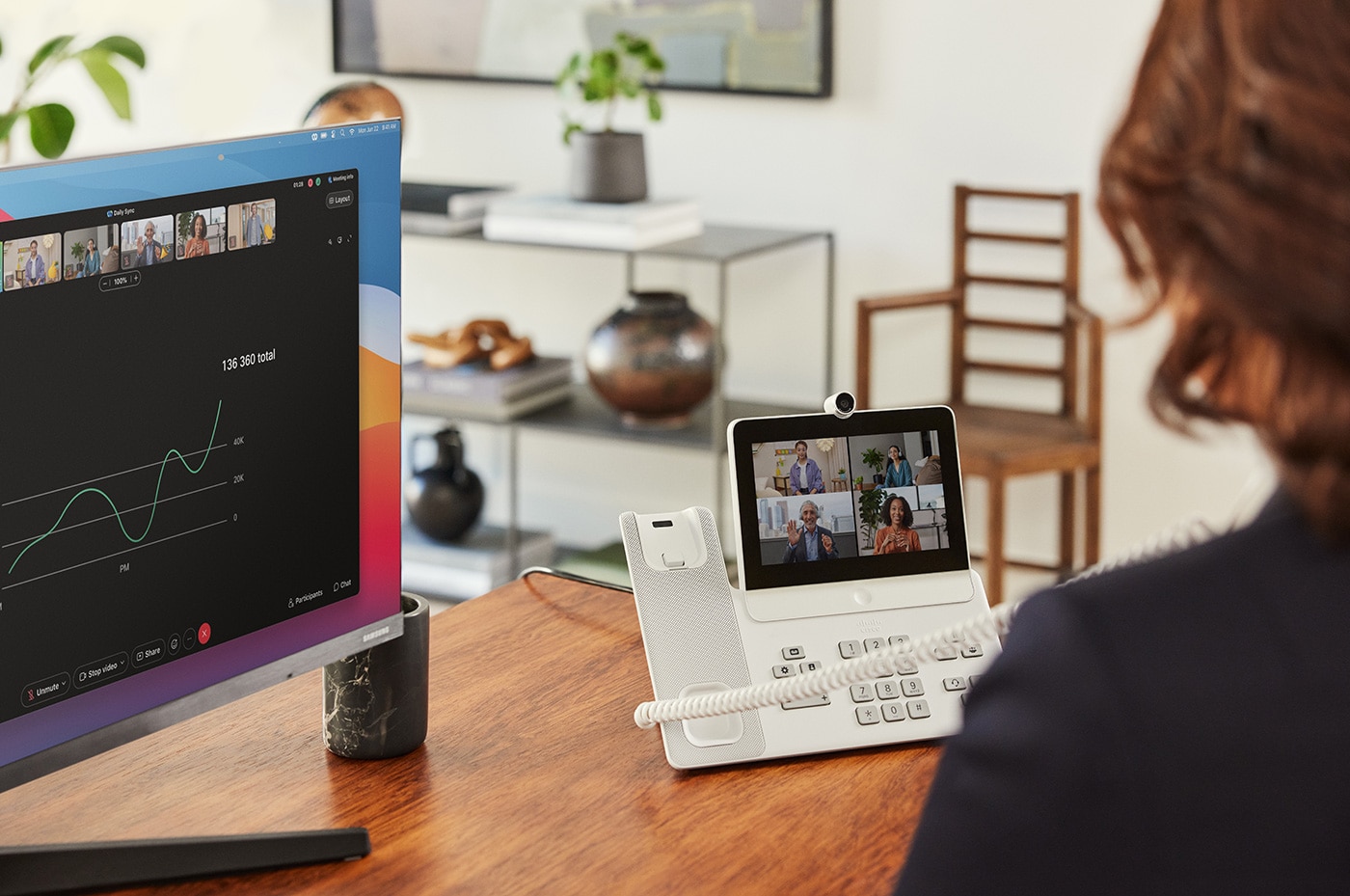 Cisco desk phone 8865 is used for video conference, while computer monitor displays UCaaS platform.