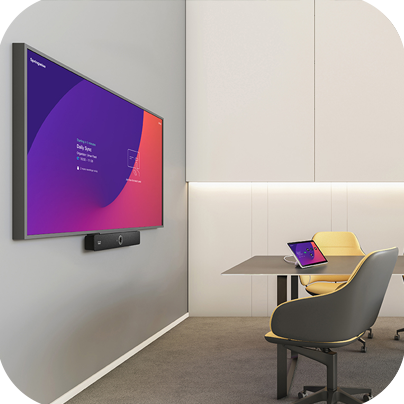 Small conference room with Cisco Board and Cisco Desk devices.