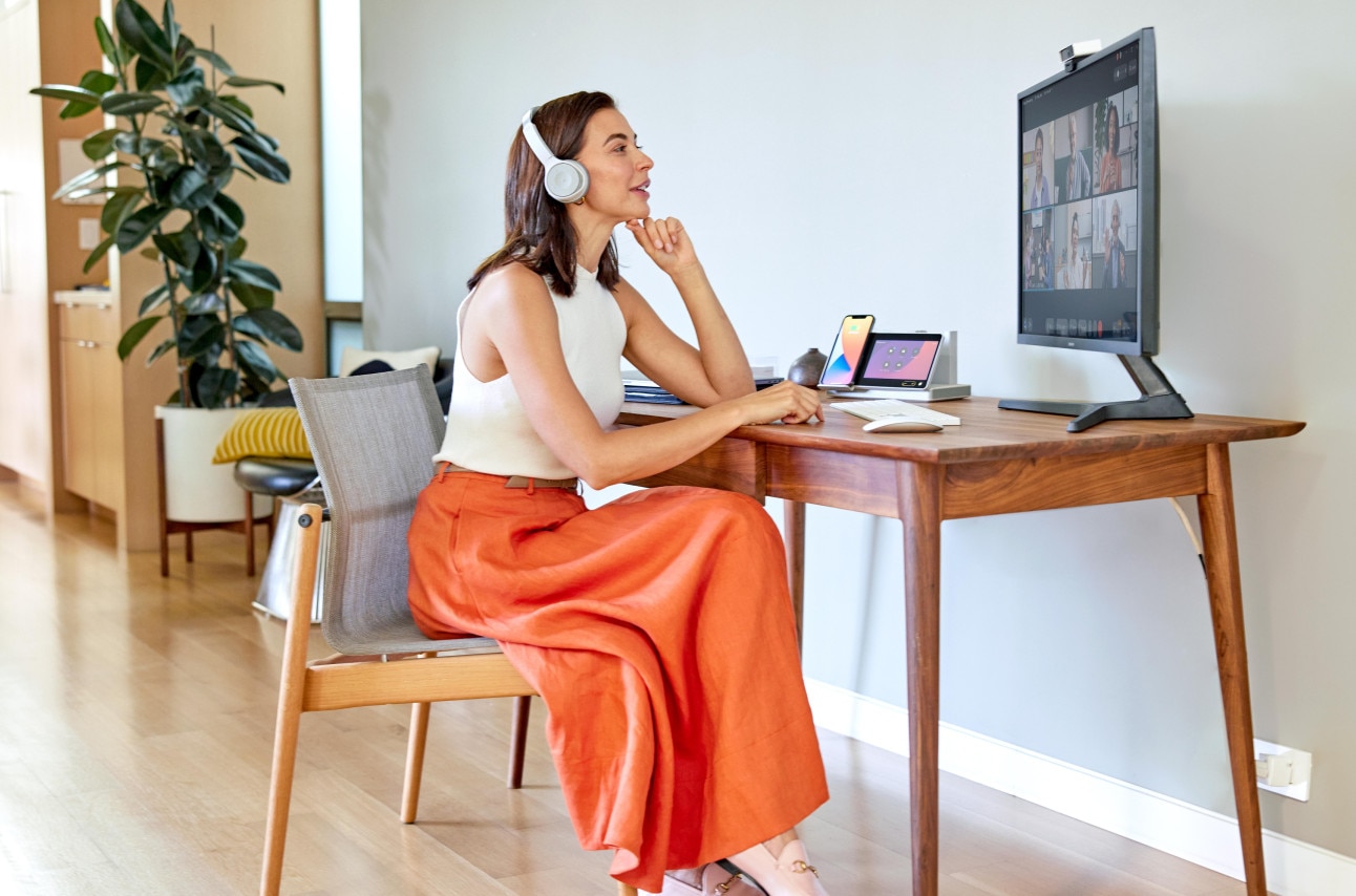 Person working from home having a video conference call on a Webex Desk device