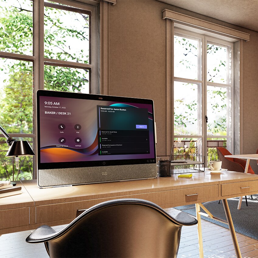 Home office workstation with Cisco Desk Pro displaying native Microsoft Teams Rooms experience.