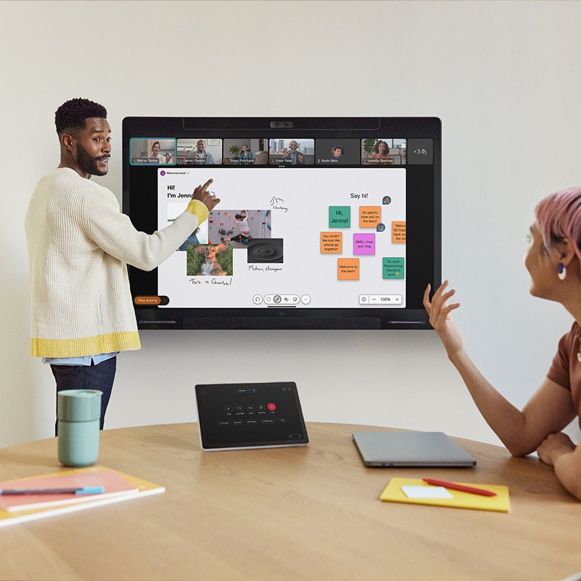 Employees use Cisco Board Pro and Cisco Room Navigator to collaborate in small conference room and with remote employees on Webex video conference.