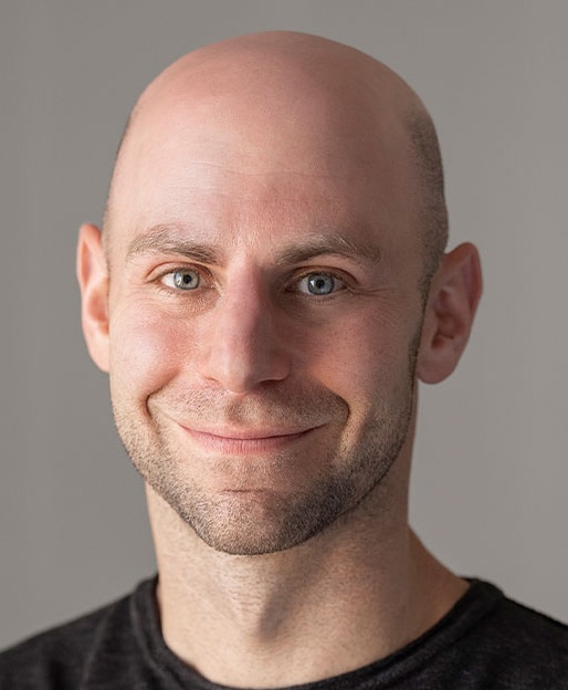 Headshot of Adam Grant, organizational psychologist at Wharton, bestselling author, and host of the podcast WorkLife