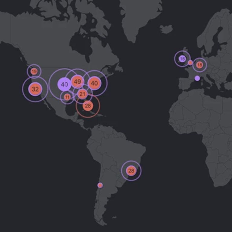 Internet outages map. Dark gray world map with light gray countries. Various spots are highlighted with red and purple circles