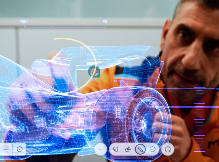 McLaren Formula 1 team collaborating in a racing environment.