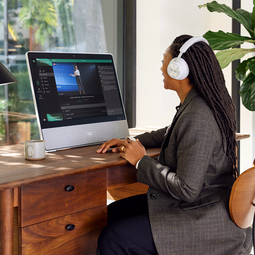 Person interacts with people using Slido in Webex Meetings