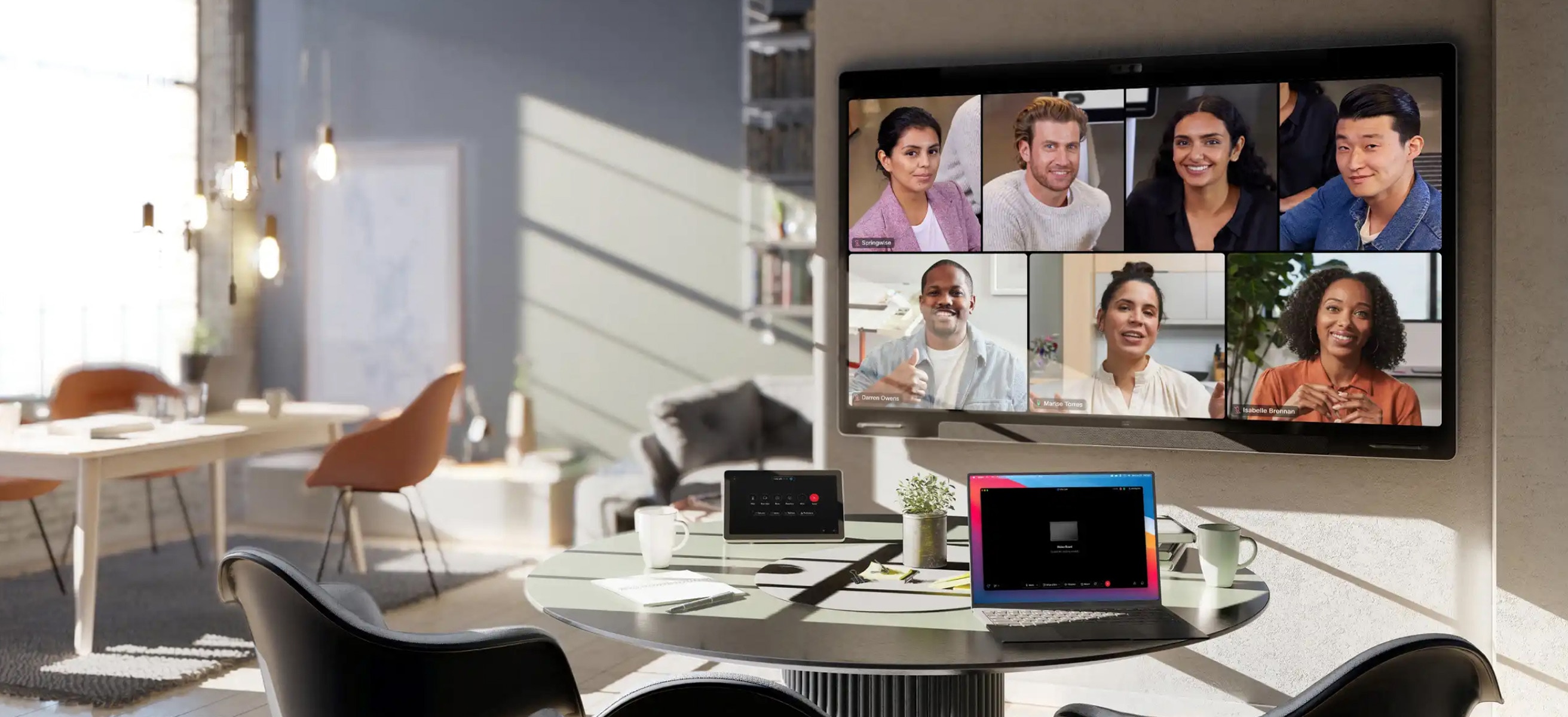 Video conference launches in open meeting space using Cisco Devices and intelligent camera frames view.